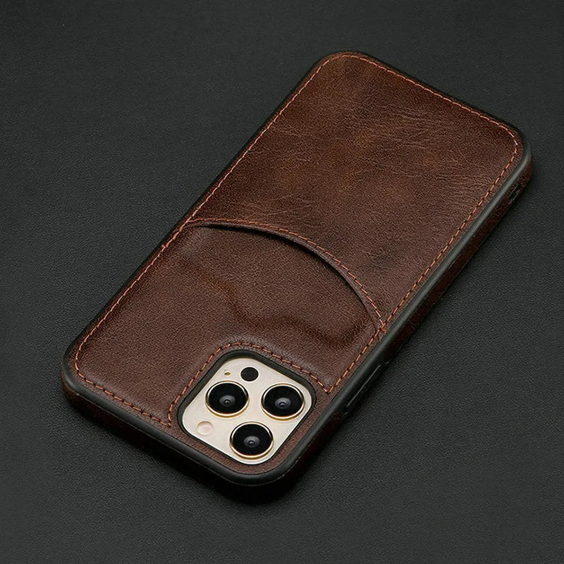 Dark blue PU leather protective case fitted on an iPhone, showing precise button and camera cutouts.