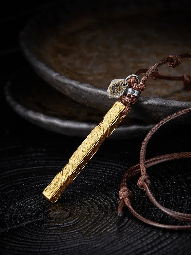 Handmade sterling silver men's necklace with gold inlay and gemstone detail