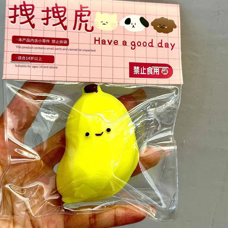 Chubby Banana Squeezing Toy in pink and green TPR material for stress relief