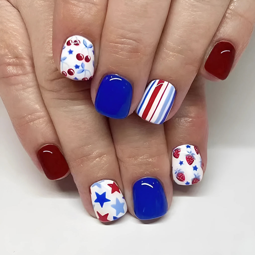 Short glossy red and blue strawberry cherry design nail stickers, 24 pieces.