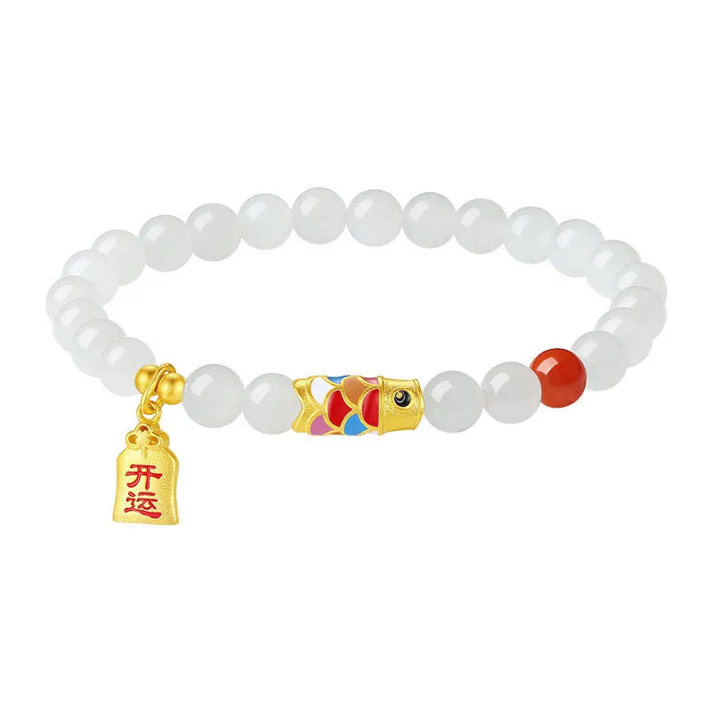S925 sterling silver bracelet with a natural Hetian jade koi fish charm and cold enamel details.