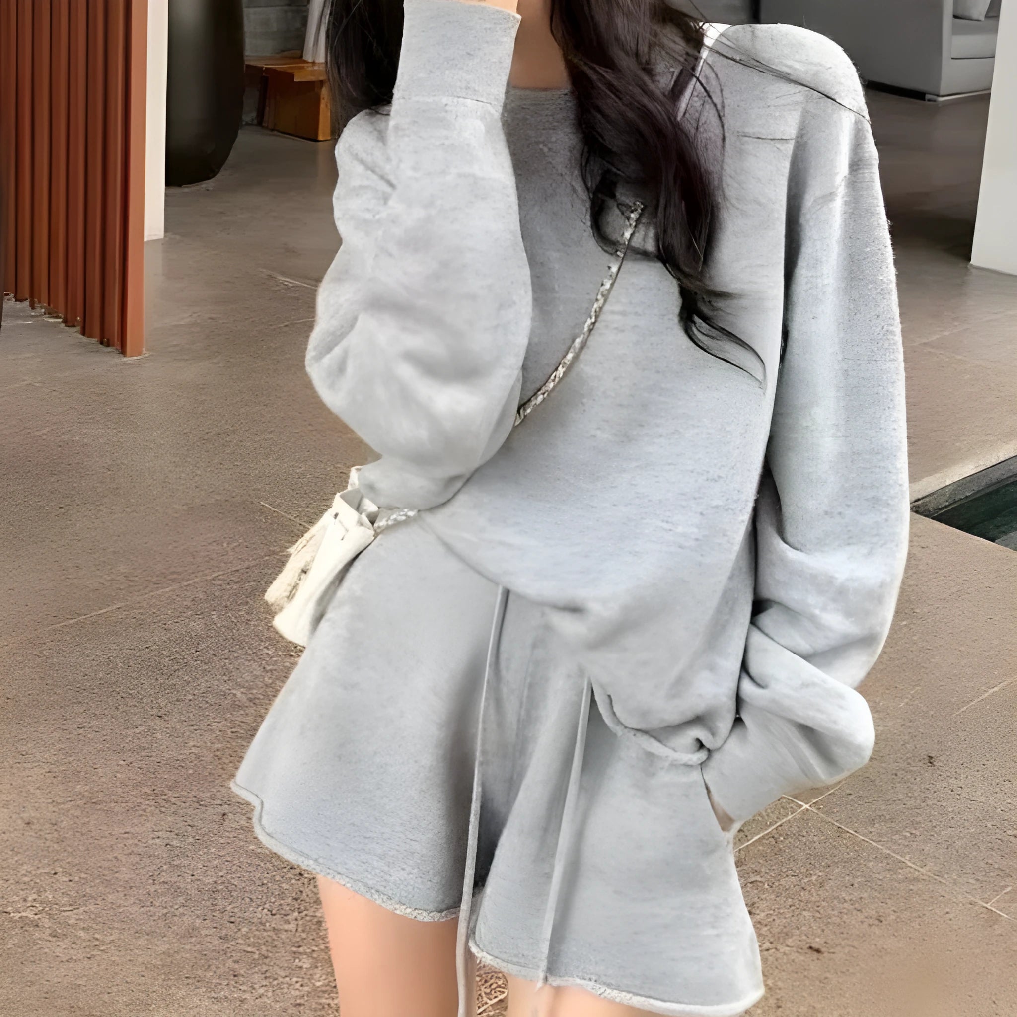 Women’s loose-fitting knitted set with long sleeve sweater and shorts in dark gray