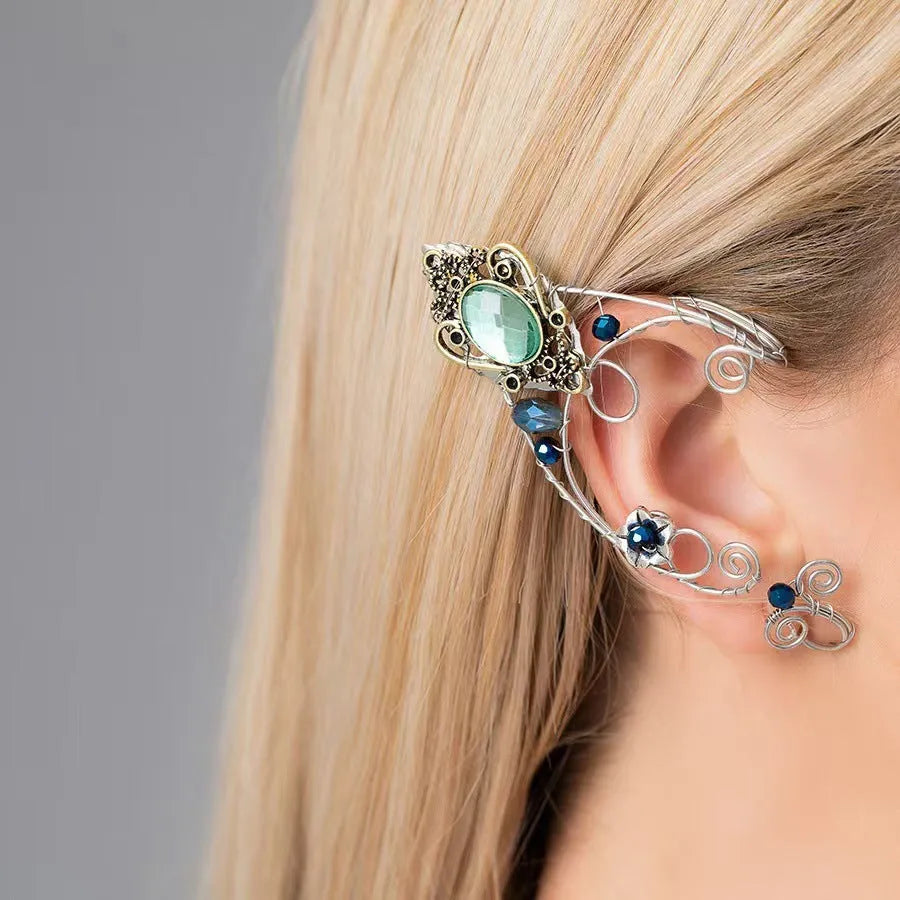 Green crystal non-piercing ear clip hand-woven original design mixed material on white background