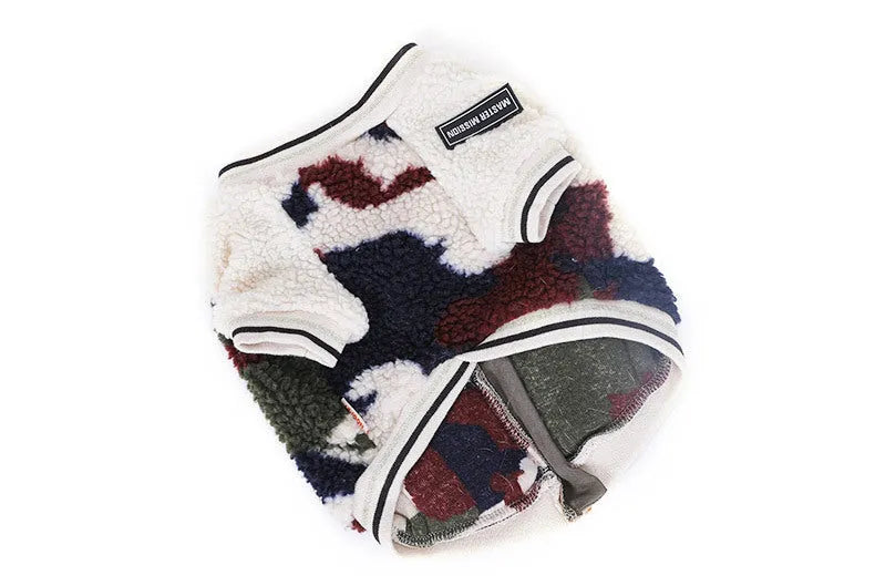 Camouflage dog hooded coat with two-legged design on a dog, showing hood and waterproof fabric