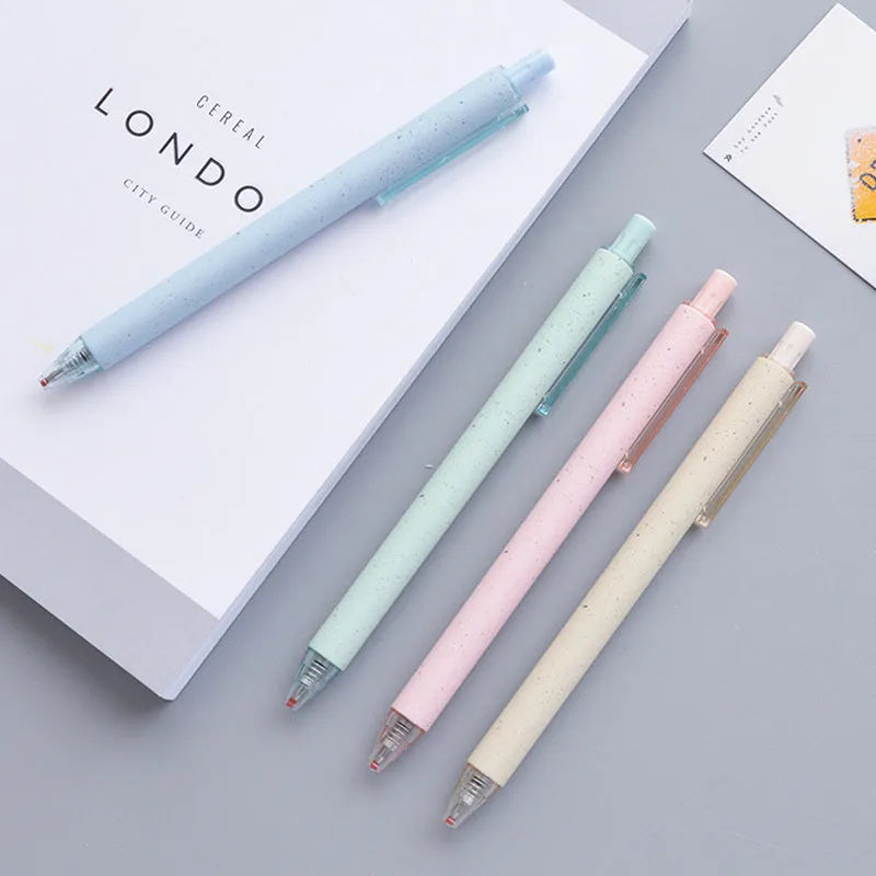 Set of 12 push-type gel pens in beige, blue, green, and pink with 0.5mm black tips.