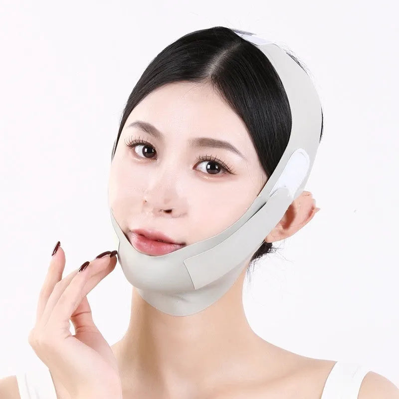 Purple and green V face shaping mask for facial lifting and tightening support.