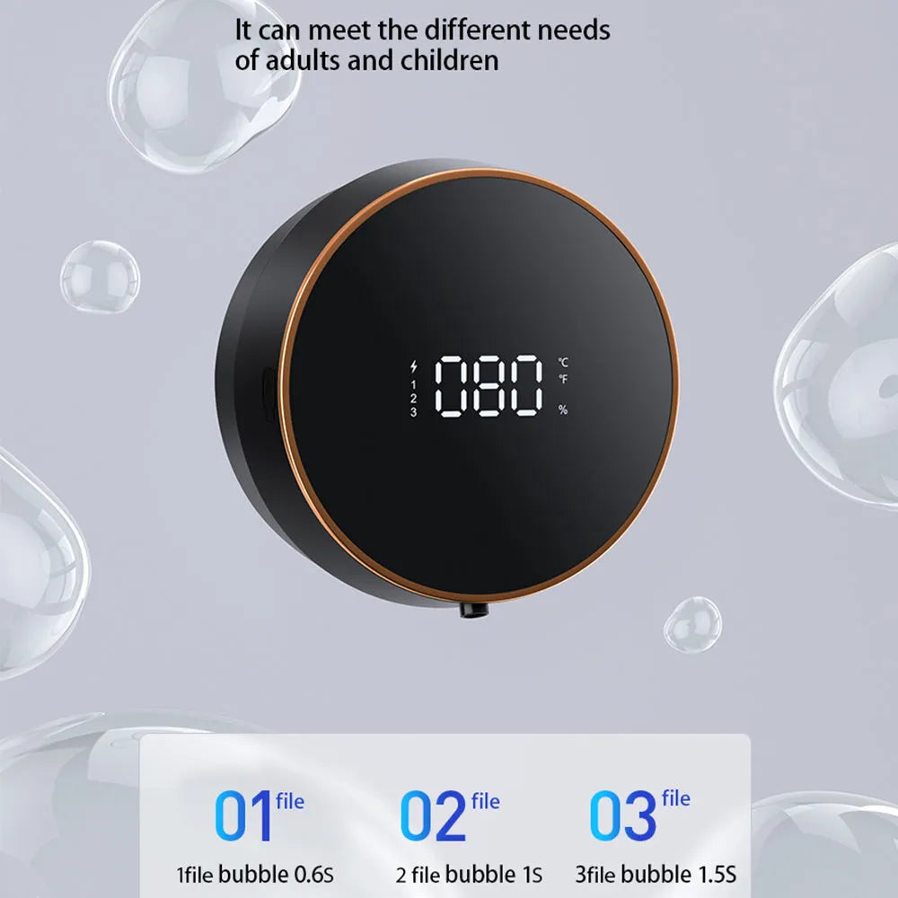 Black and white automatic sensor foam soap dispenser mounted on a wall with USB charging cable.