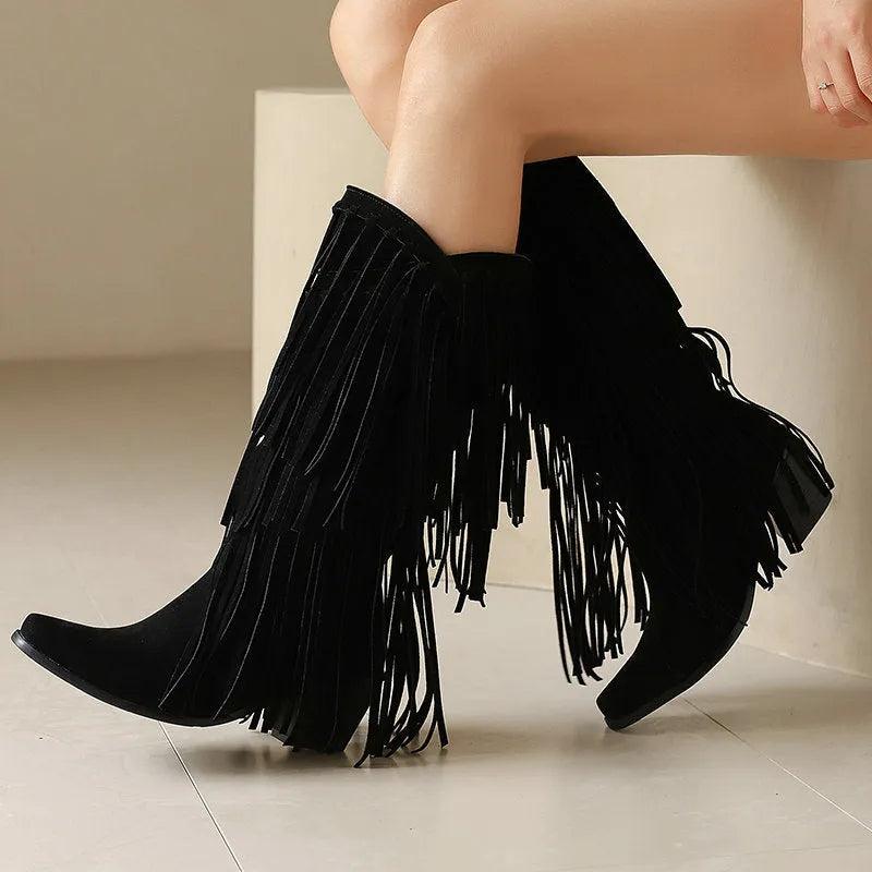 Women's black suede high boots with tassels, a chunky heel, and a waterproof platform.