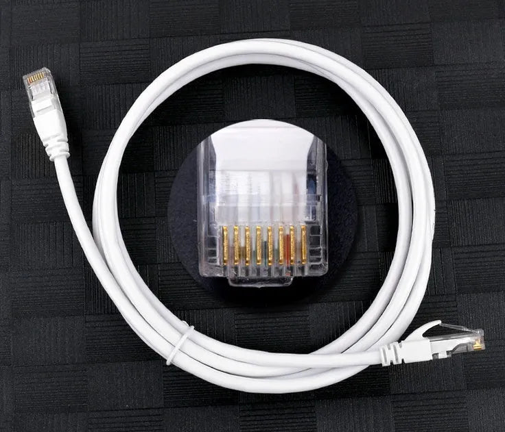 White Cat6 RJ-45 Ethernet network cable with CCA conductors on a plain background