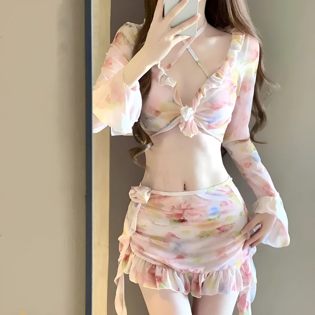 Women's cherry blossom pink floral bikini swimsuit on a mannequin