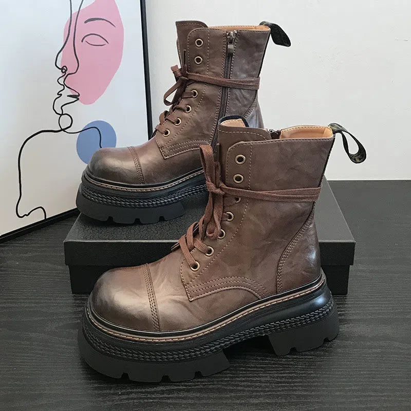 Women's black or brown ankle boots with 3-5 cm chunky mid heel, side zipper, waterproof platform, round toe, and rubber sole.