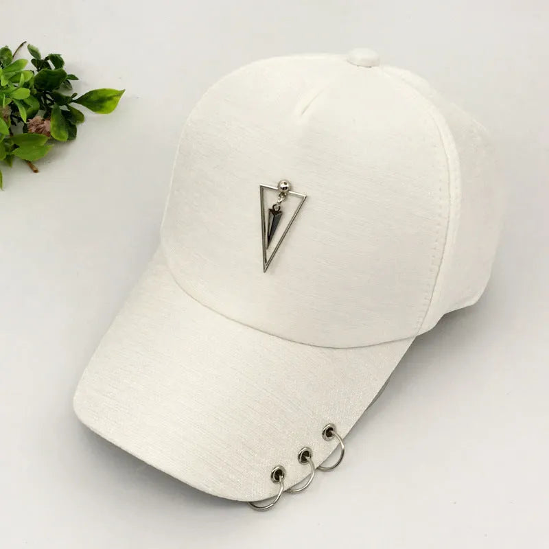Adjustable cotton sunshade baseball cap with wide brim, dome top, rivet detail, and monochrome pattern in black or apricot.