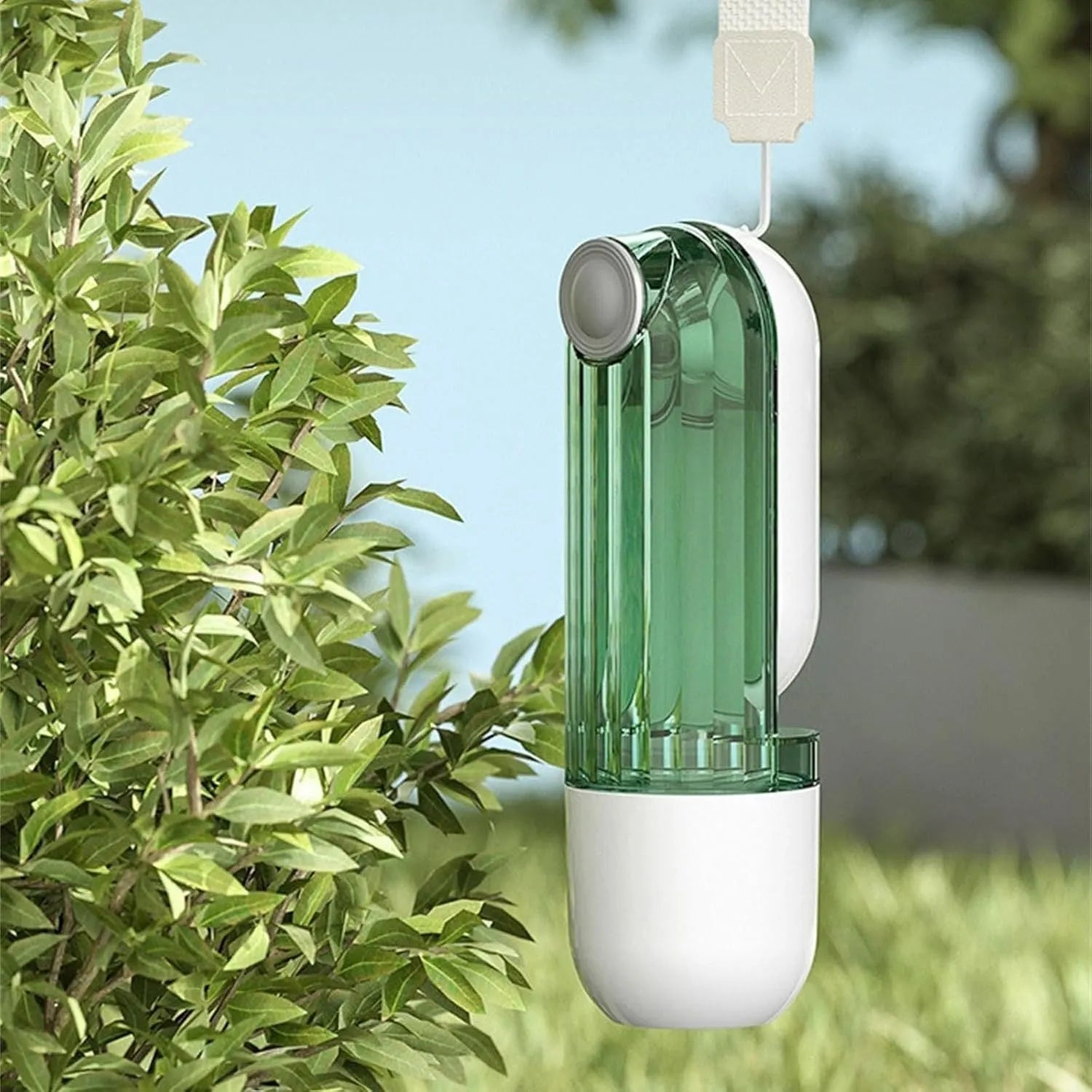 Foldable portable dog water bottle with built-in food dispenser in beige or green.