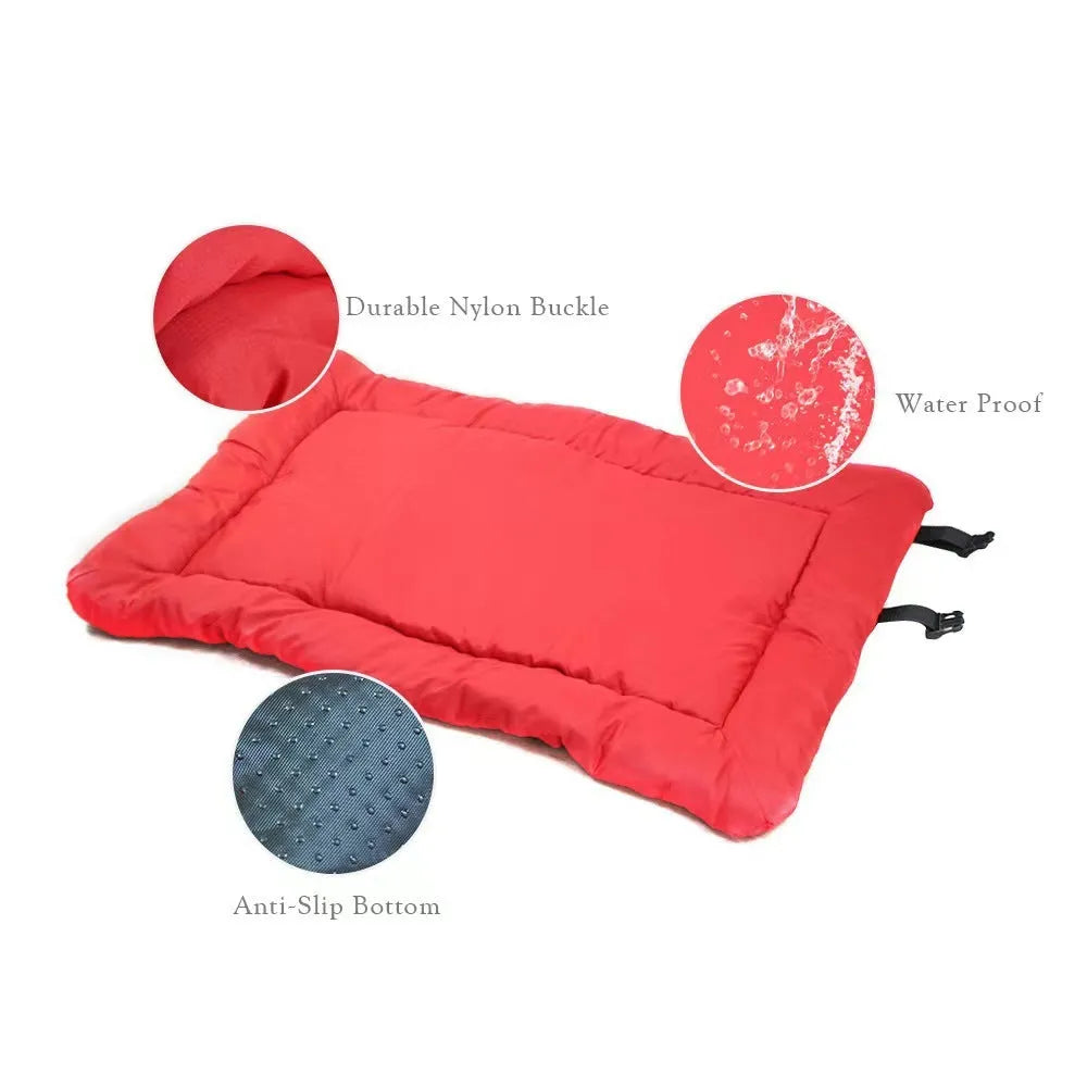 Blue foldable waterproof dog bed shown both open and folded with nylon buckles, on grass.
