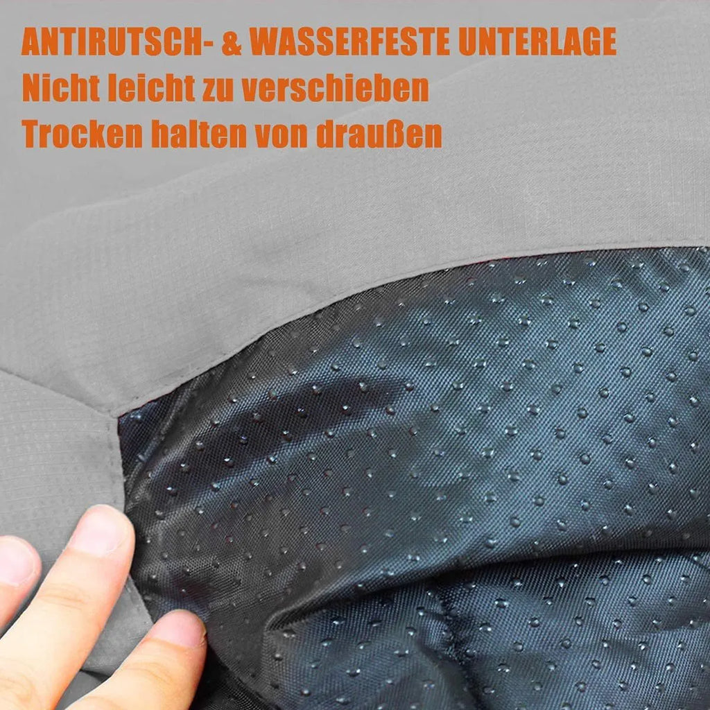 Blue foldable waterproof dog bed shown both open and folded with nylon buckles, on grass.