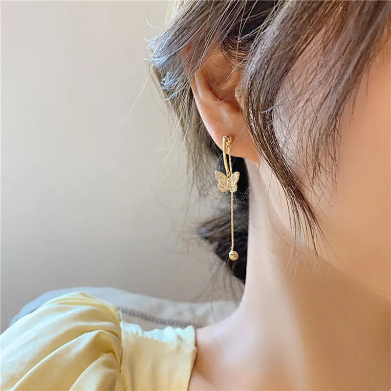 Alloy golden butterfly tassel earrings with electroplated finish for women