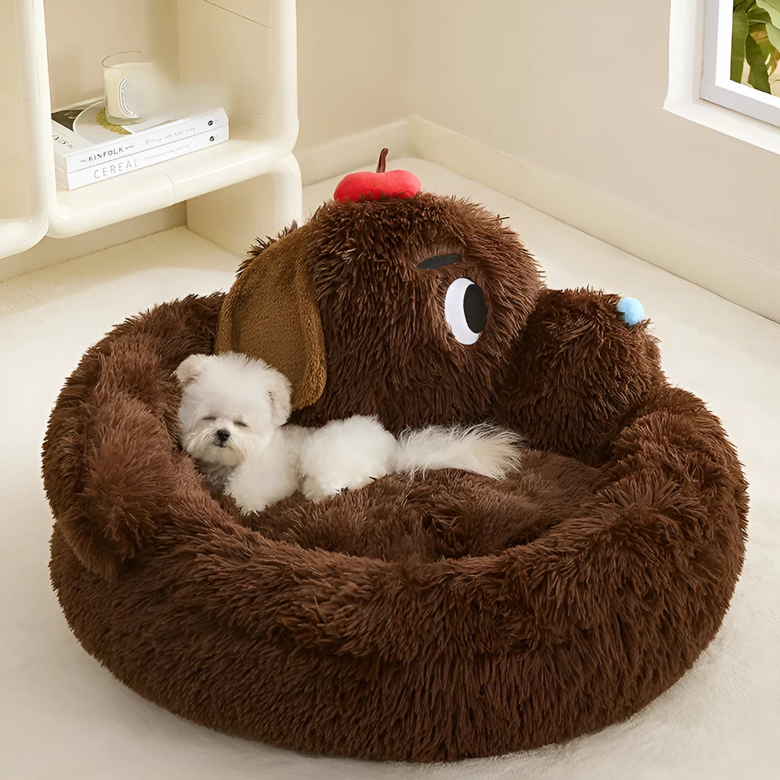Plush grey sofa bed for small dogs and cats with raised sides, shown in medium and large sizes.