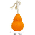 Natural rubber stuffable dog toy for small dogs, shown with a longer strap for fetching and tugging.