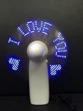 White handheld mini fan with flashing blue I Love You LED display, showing dimensions.