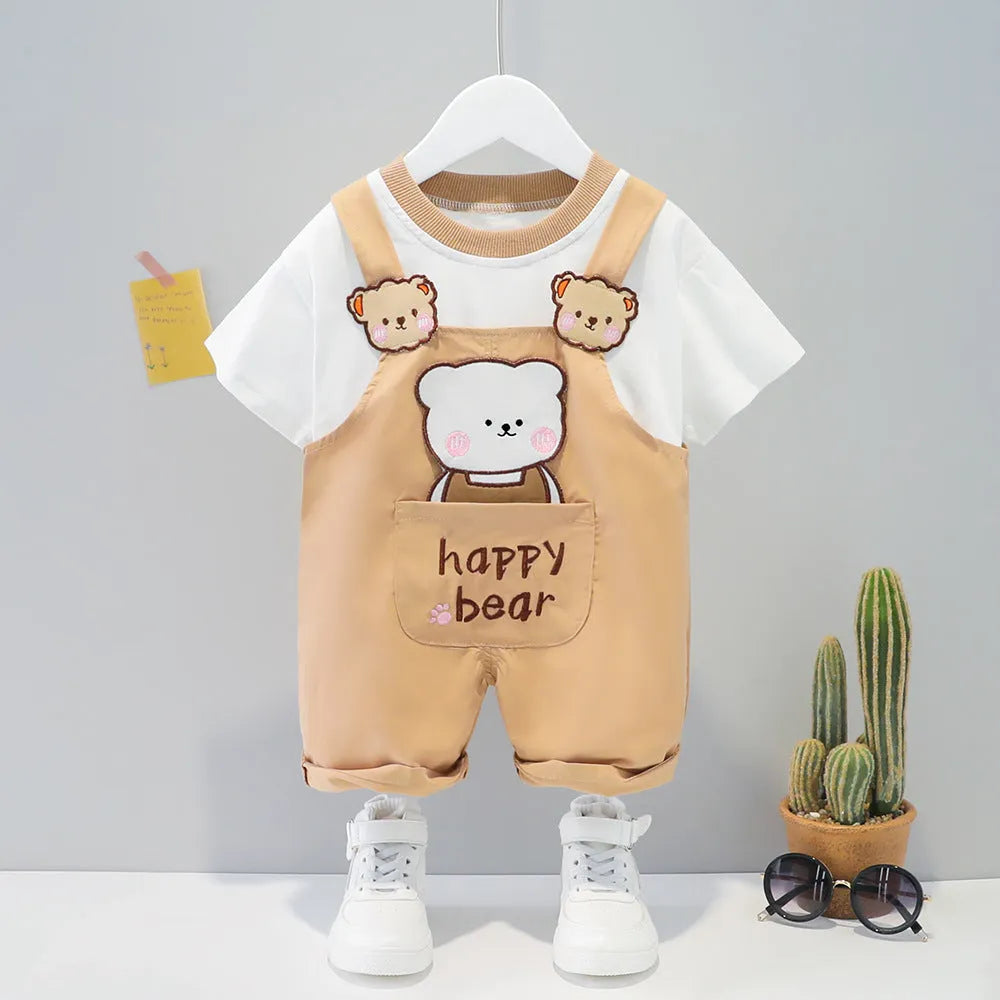 Yellow children's cotton short-sleeved romper with cartoon print and adjustable straps.