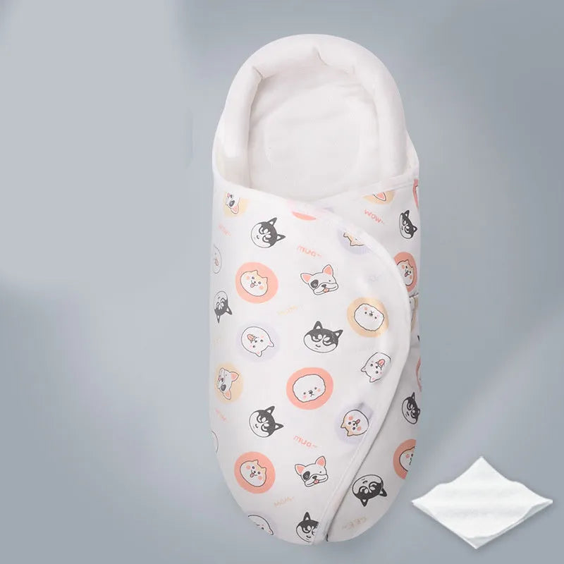 Cotton baby anti startle swaddle measuring 30 by 60 centimetres in a colourful print design.