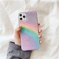 Colourful rainbow gradient striped TPU protective case for various iPhone models on a white background.