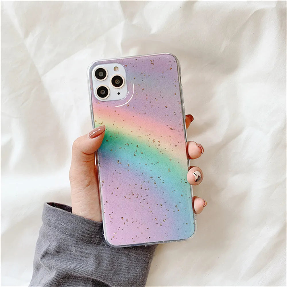 Colourful rainbow gradient striped TPU protective case for various iPhone models on a white background.
