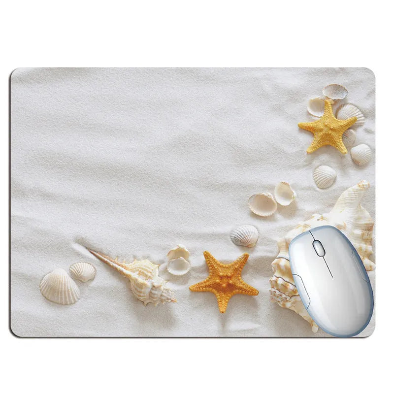 Colourful summer beach holiday wishing bottle design on a black rubber computer mouse pad