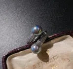 Twist plate geometric ring with white shell pearl and inlaid zircon accents