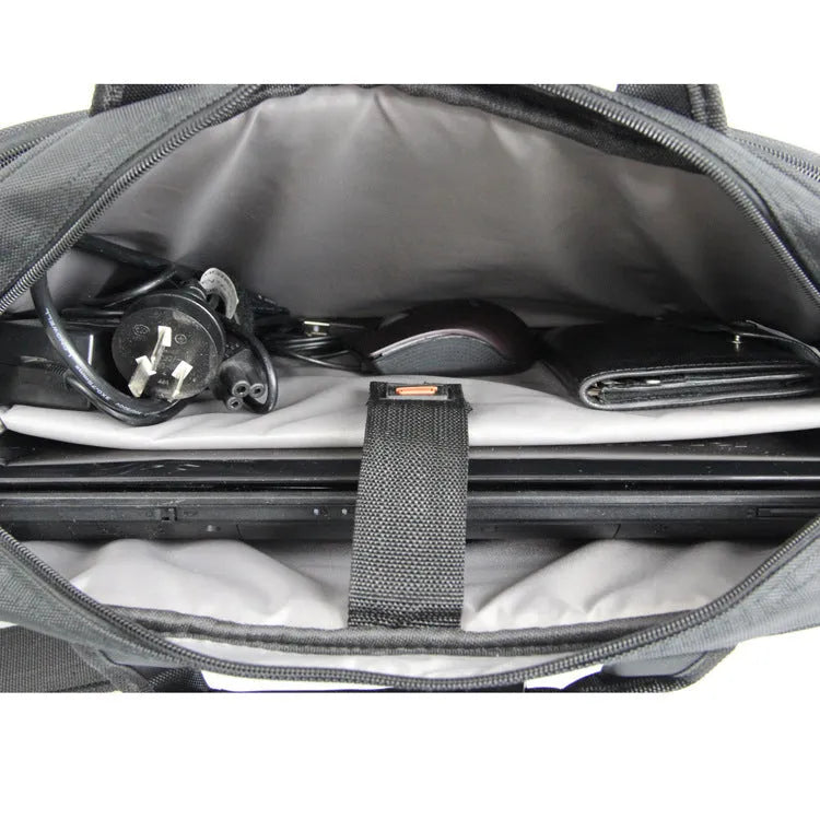 Black nylon one-shoulder computer bag for laptops up to 17.3 inches with hidden strap and shock protection
