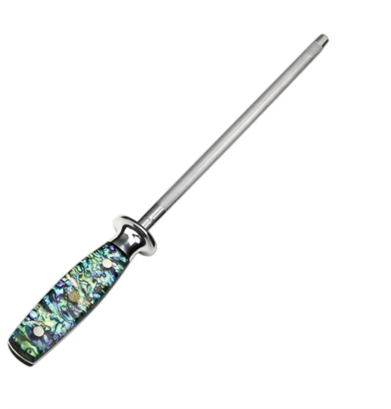 High carbon steel manual knife sharpener with abalone shell handle on a kitchen surface.