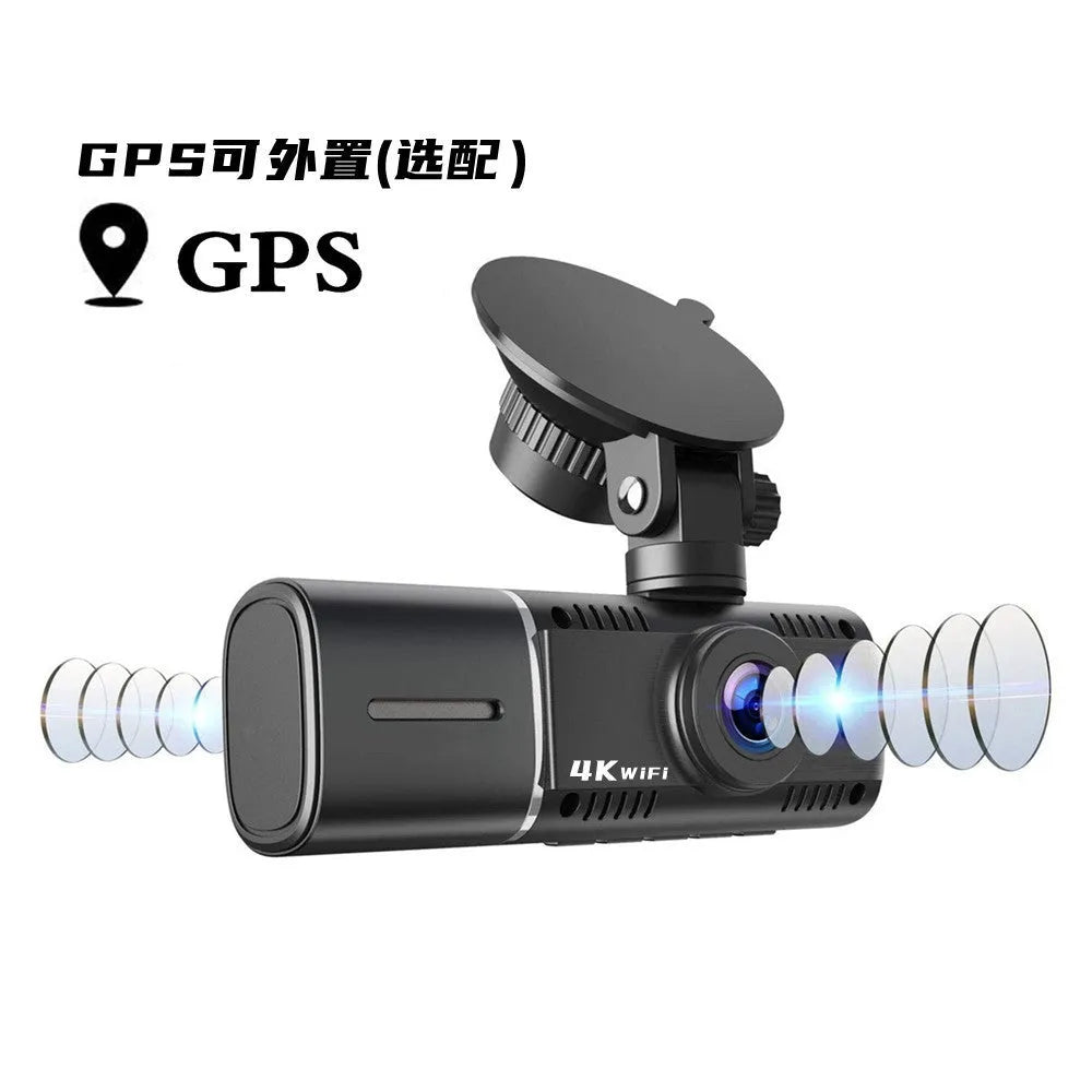 Black dual-lens car dash cam with 1.5-inch screen, mount, and car charger on a dashboard.