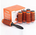 Set of six ceramic hair styling brushes in assorted colours with detachable handle and PVC carry bag