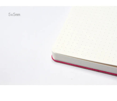Blue A5 dotted notebook with soft imitation leather cover open to show dot grid pages
