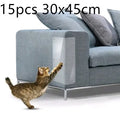 Two transparent PVC self-adhesive cat claw protector pads on a leather sofa arm, each 47x15cm