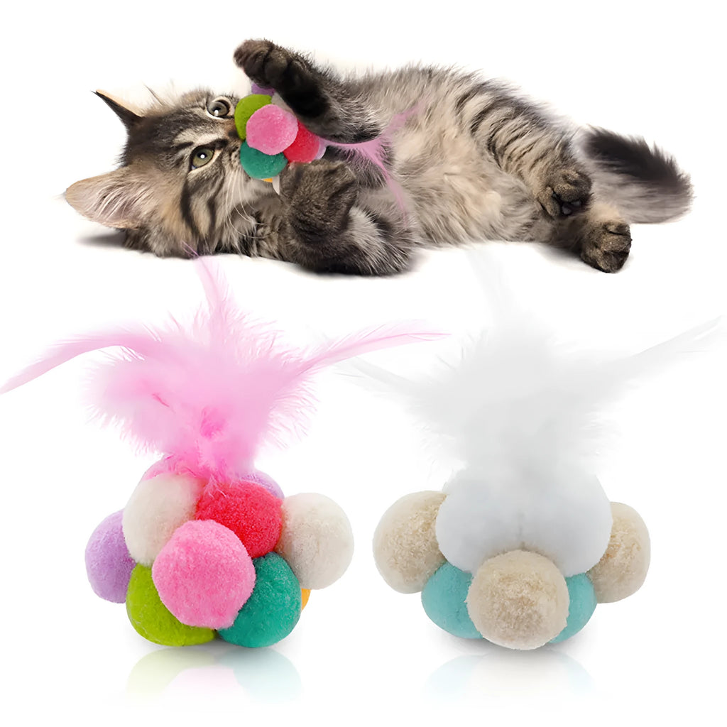 Cat toy feather bouncy ball with colourful pink feathers and blue white feathers for interactive play