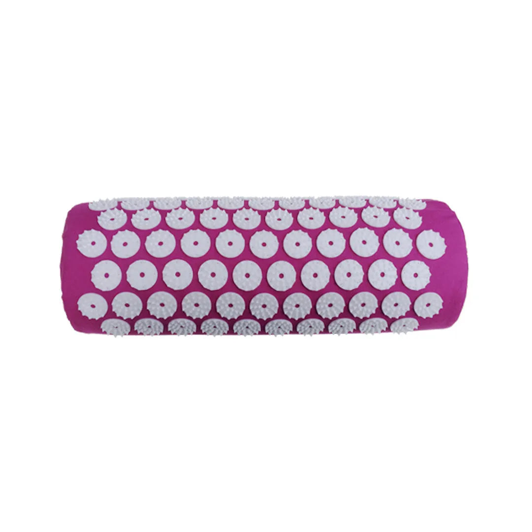 Black and blue acupuncture massage mat with cushion and headrest on floor