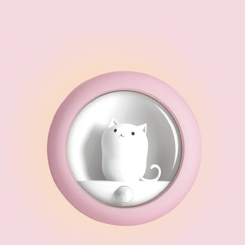 Baby bedside sleep lamp showing orange, pink, and white colour options with projection light feature