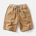 Men's retro American-style cargo shorts in straight-leg cut available in khaki, white, and green colours