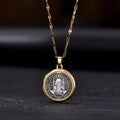 Gold electroplated St. Benedict cross pendant on alloy O-ring chain necklace