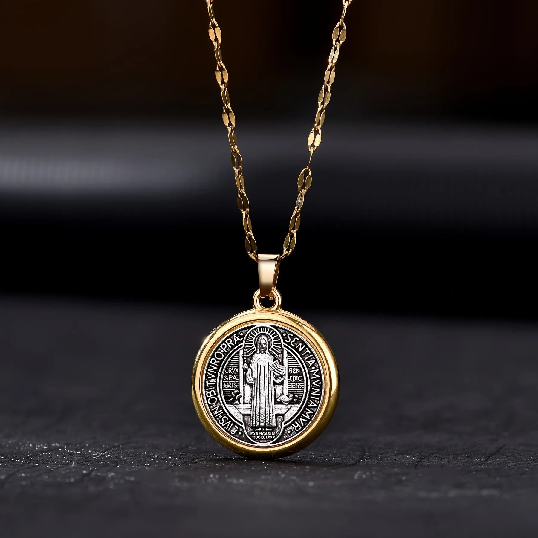 Gold electroplated St. Benedict cross pendant on alloy O-ring chain necklace