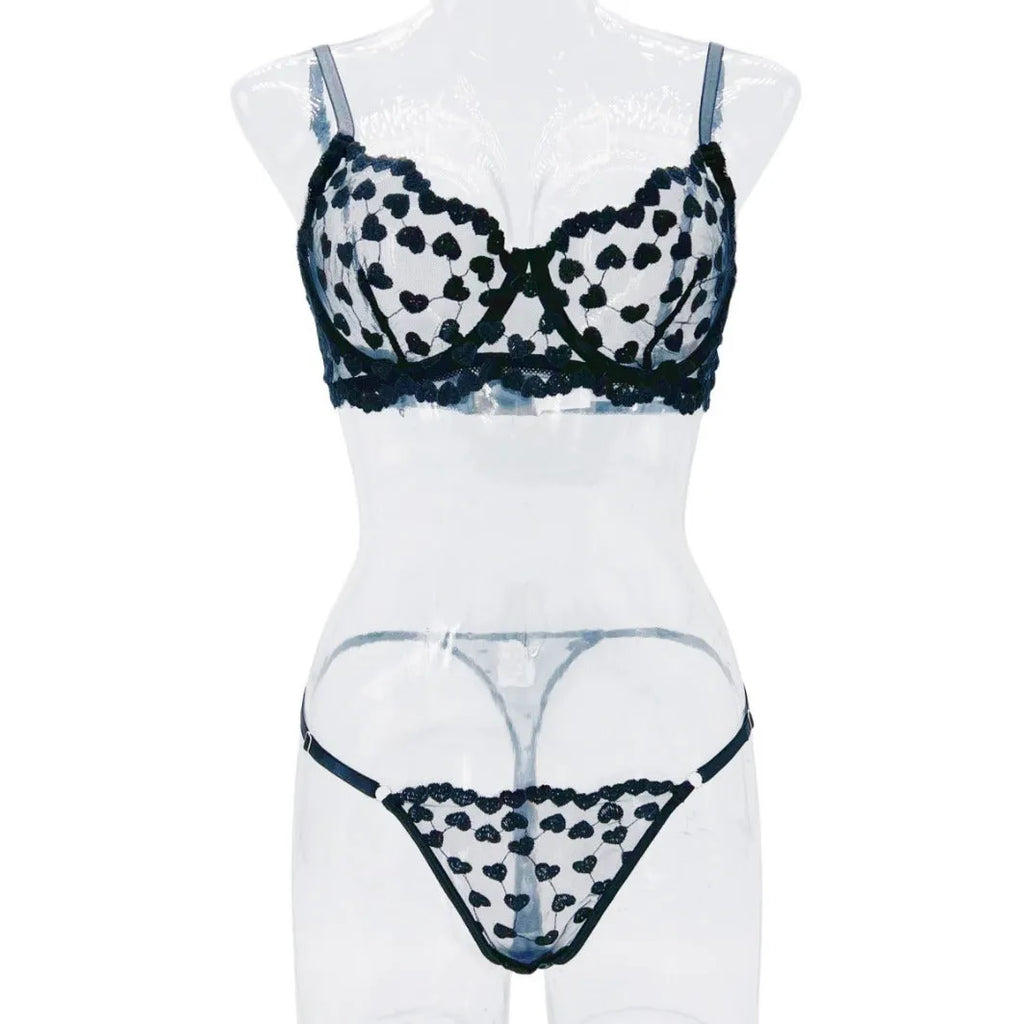 Women's black mesh suit set with lace trim showing crop top and high-waisted shorts combination