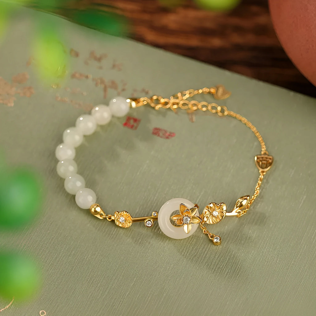 Women's antique bracelet with Hetian jade inlay and lotus peace buckle design in 925 silver