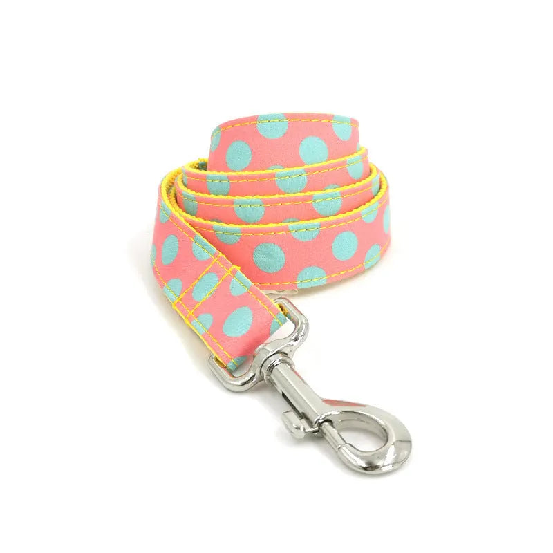 Yellow polka dot dog collar and lead set with bow accents and five size options