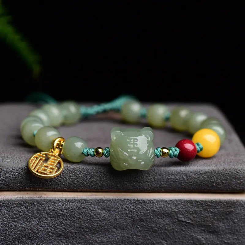 Natural Hetian Jade and cinnabar bracelet with beeswax beads and animal Zodiac charms
