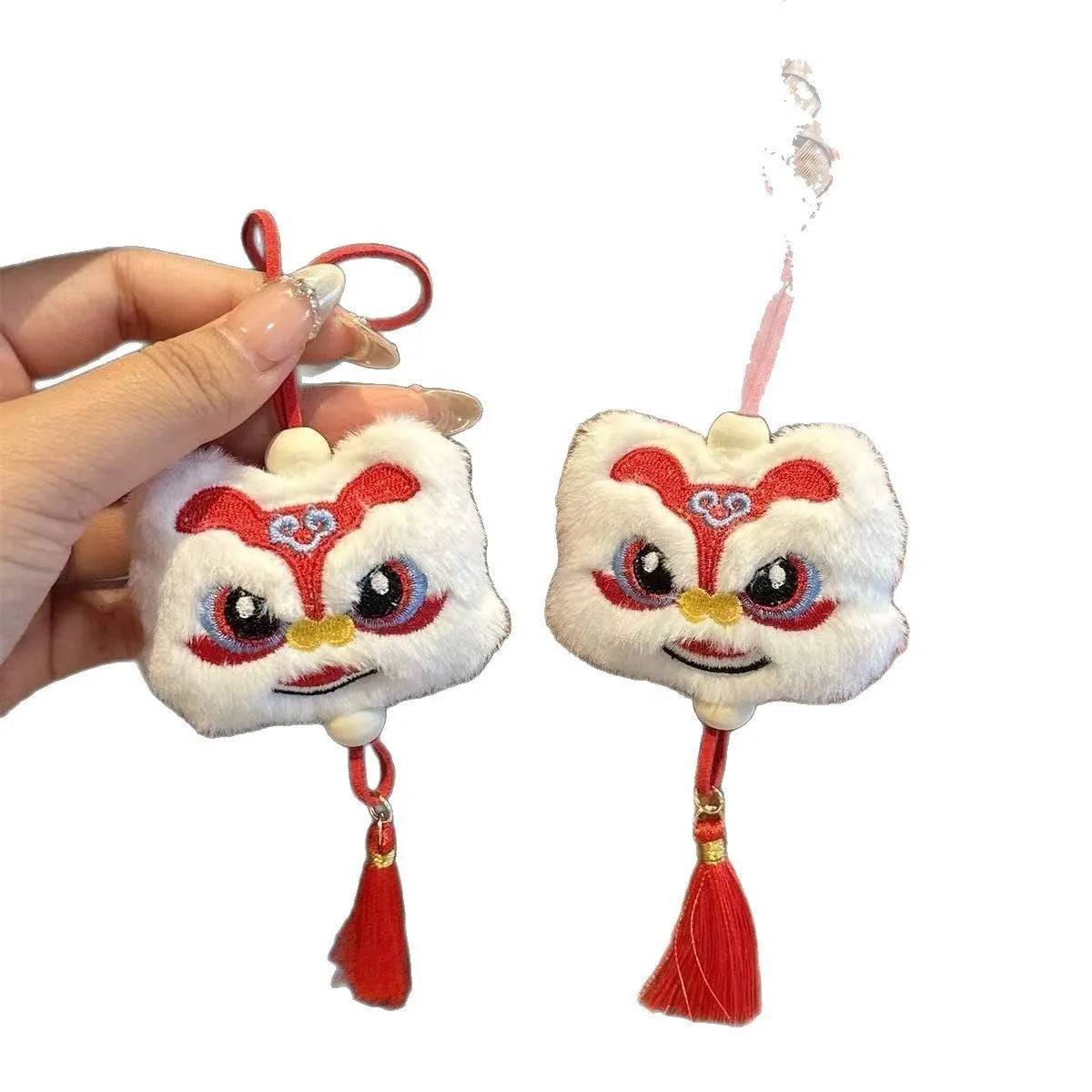 Chinese style blue plush lion keychain ornament with tassel and star stone decorative detail
