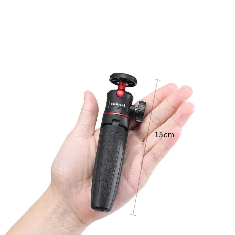 Black red and white aluminium and ABS mini desktop tripod stand for mobile phones.