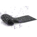 Black foldable silicone Bluetooth keyboard with 108 keys, 360 x 105 x 8 mm, IP67 waterproof, USB charging.