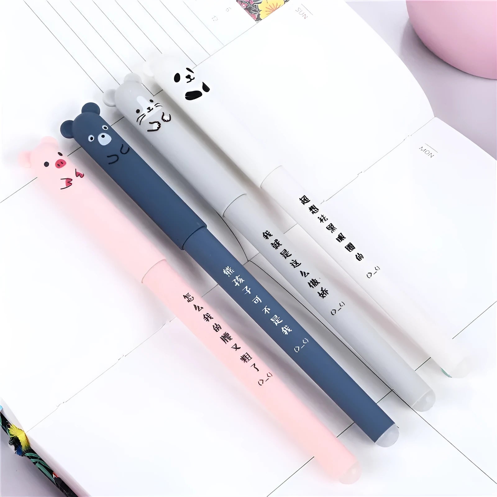 Hot erasable pen with 0.5mm tip in black, blue, and red colours showing refill and nib replacement components