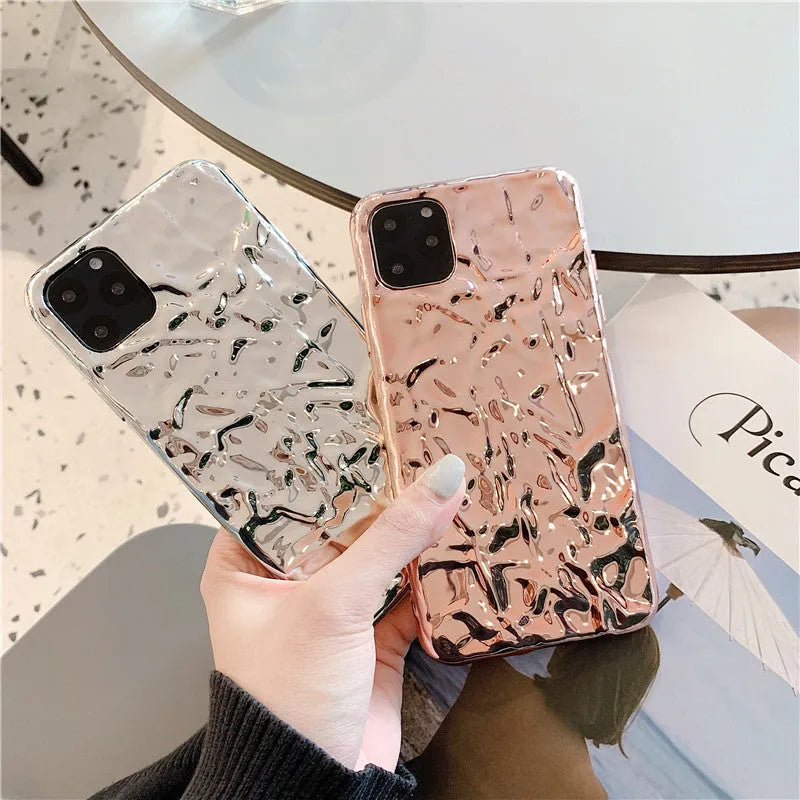 Electroplated rose gold TPU phone case for iPhone, showing precise camera and port cutouts.